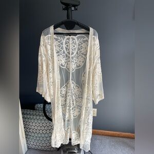 Great coverup or add to an outfit.